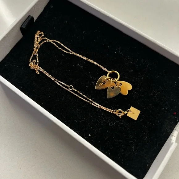 GINETTE NY
Angele 18K Rose Gold 3 Mini Heart Charms 17” Necklace - Picture 13 of 15